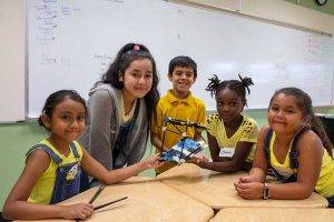 children smiling table