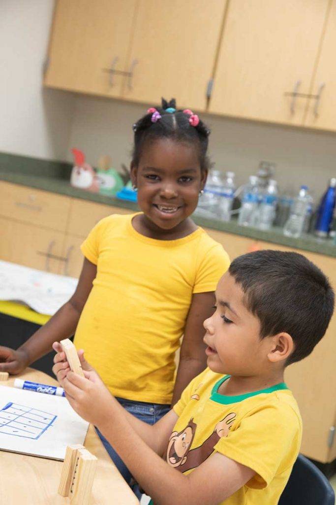 little girl in yellow