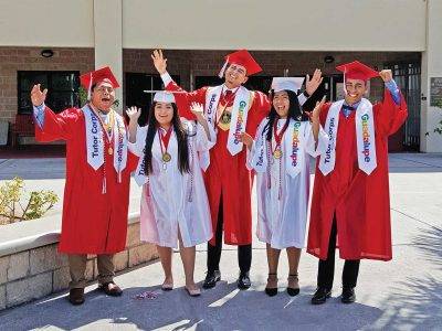 Guadalupe graduates attending a ceremony